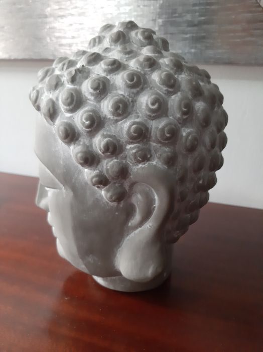 Cabeça de buda em cerâmica
