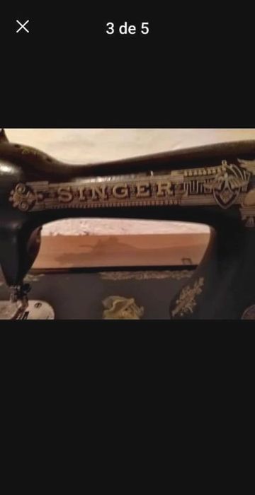 Máquina de costura SINGER ,cabeça e pedal em ferro.