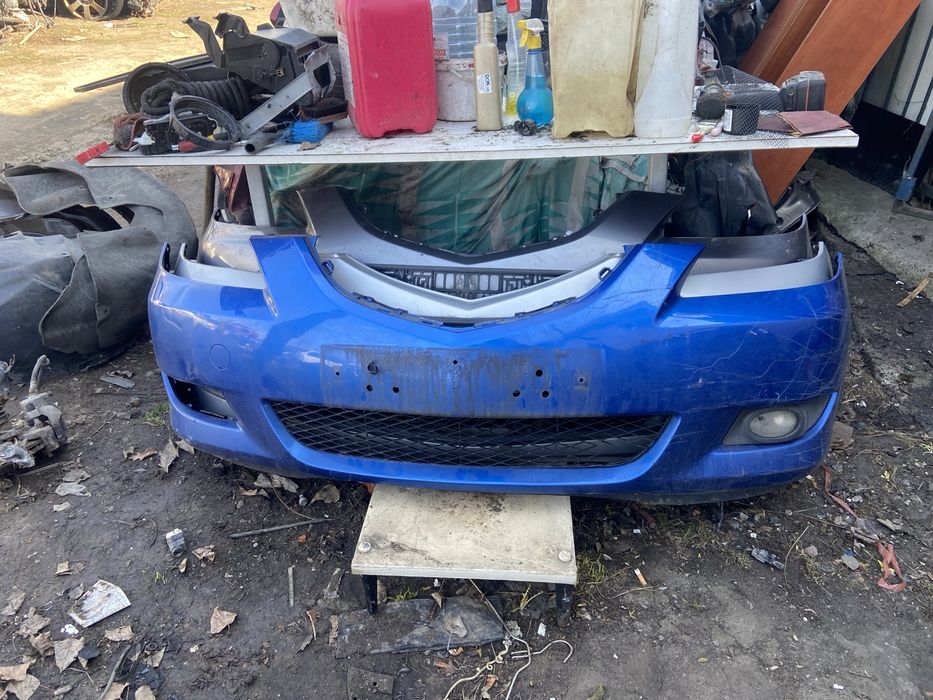 Передний бампер мазда 3бк телевизор уселитель капот