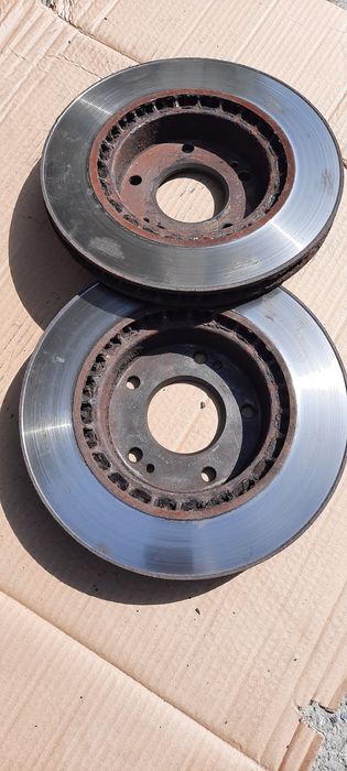 Продам тормозные диски Киа церато купе 2012г.в