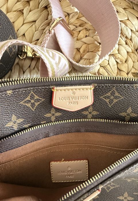 Mala Louis Vuitton com alça rosa
