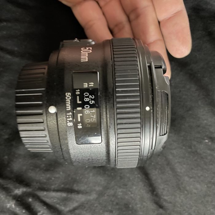 Nikon d5100 usada lente nikon 18-55 e lente yongnuo 50mm