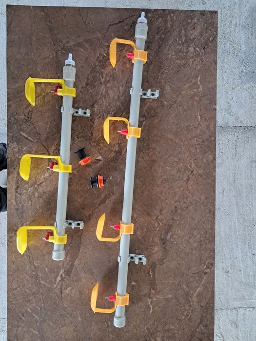 Поїлки ніпельні .