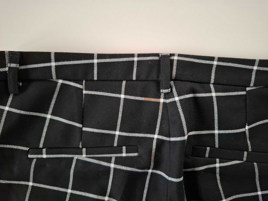 Spodnie materiałowe w kratkę Orsay 36