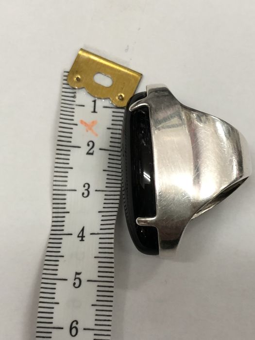 Vendo Anel em prata com pedra preta