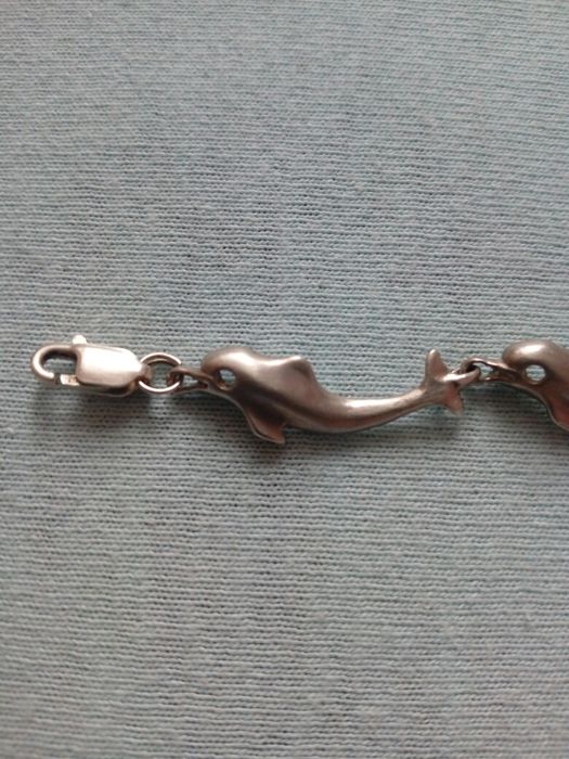 Srebrna bransoletka delfiny