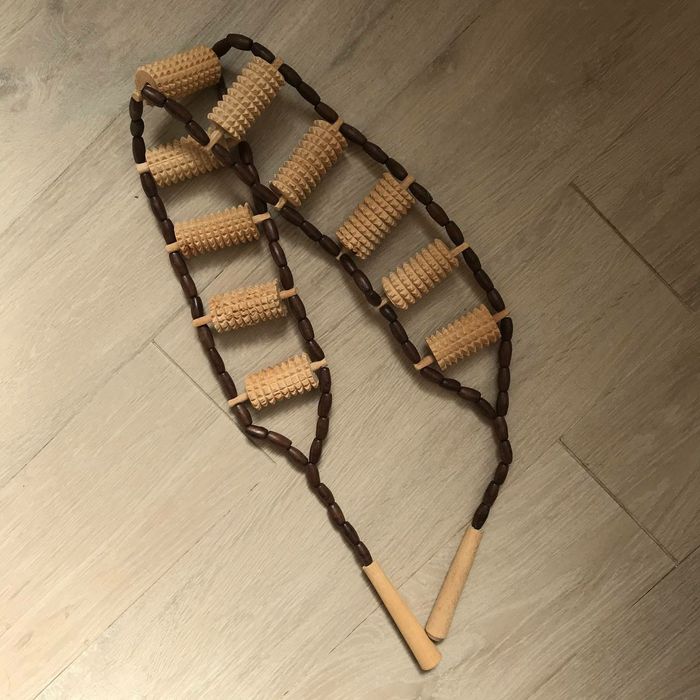 Massajador de madeira