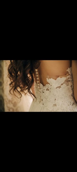 Весільна сукня зі шлейфом