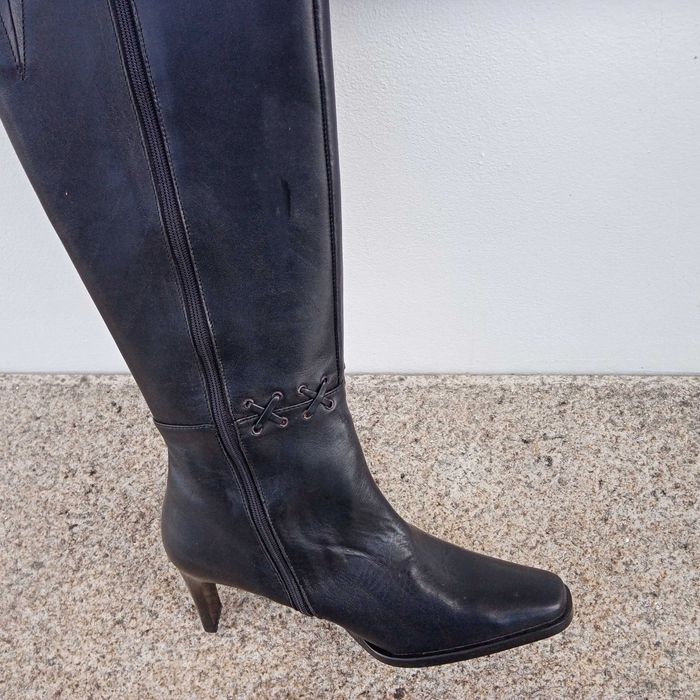 Botas cano alto novas