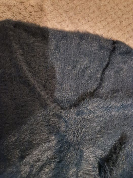 Zielony sweter z dekoltem