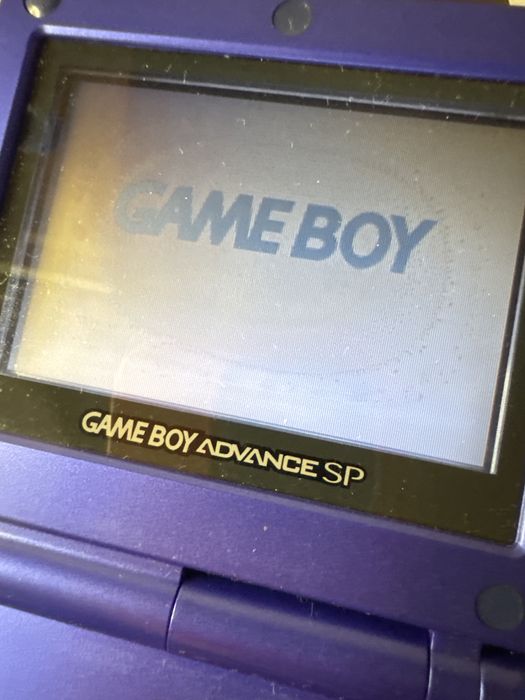 Konsola Nintendo Game Boy Advance SP - niebieska, w pudełku z ładowarką, grą i instrukcją