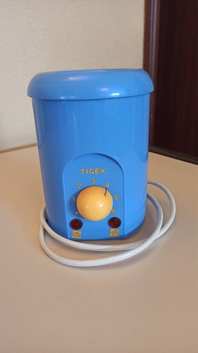 Aquecedor de biberões  12 V / 220 V
