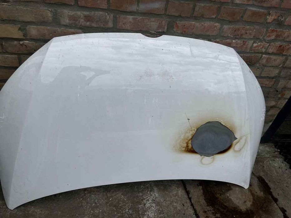 VAG Caddy 10-15 капот дефект KA0442 1T0823031P