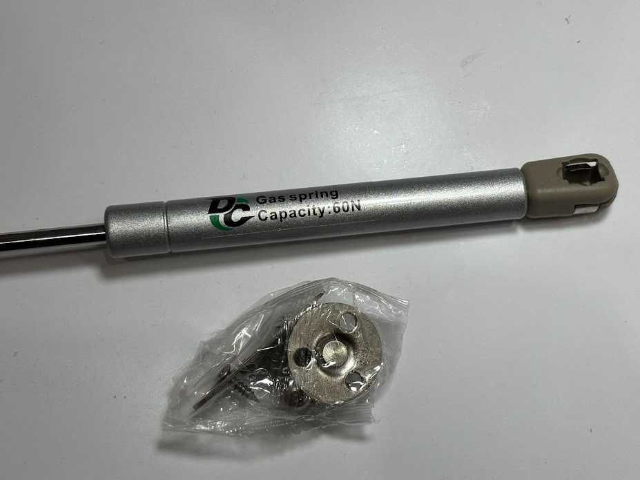 Амортизатор газовий DC для ДСП 60N відкриття дверей НОВІ ціна за 8. шт