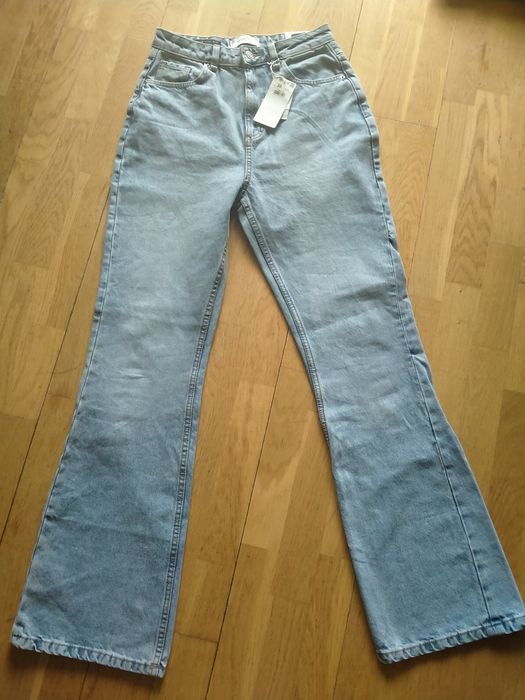 Jeansy boot cut rozszerzane  Reserved 36