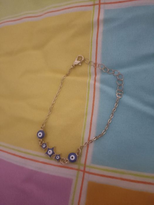 Pulseira com olho mau olhado com estrelas cor azul