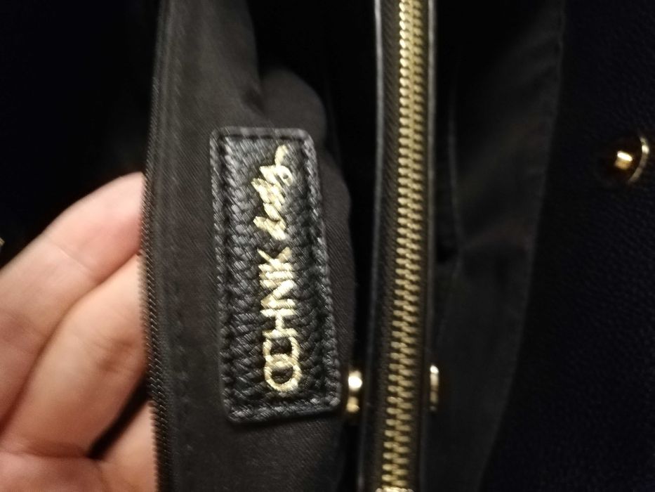 torebka skórzana Ochnik Daily liczne kieszonki zamki