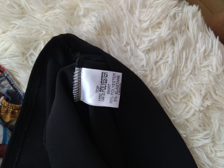 Sukienka rozcięcia na rękawach 36 38