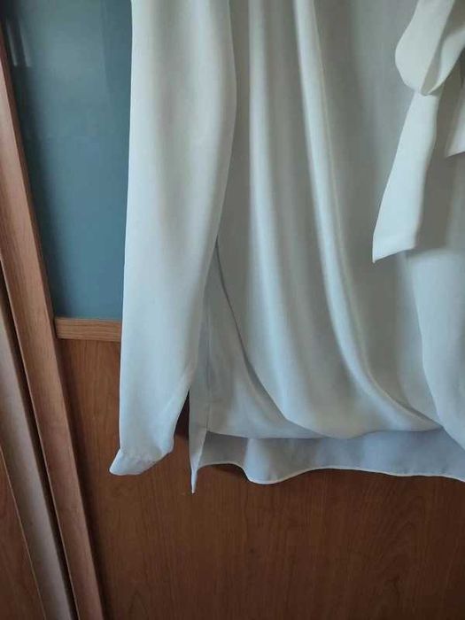 Blusa efeito cruzado com laço S
Nunca cheguei a usar
Shop1One