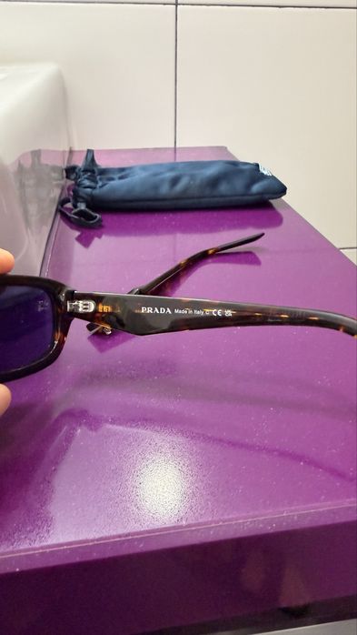 2 pares de oculos da prada