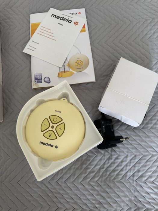 Medela swing електричний молоковідсмоктувач + клапани
