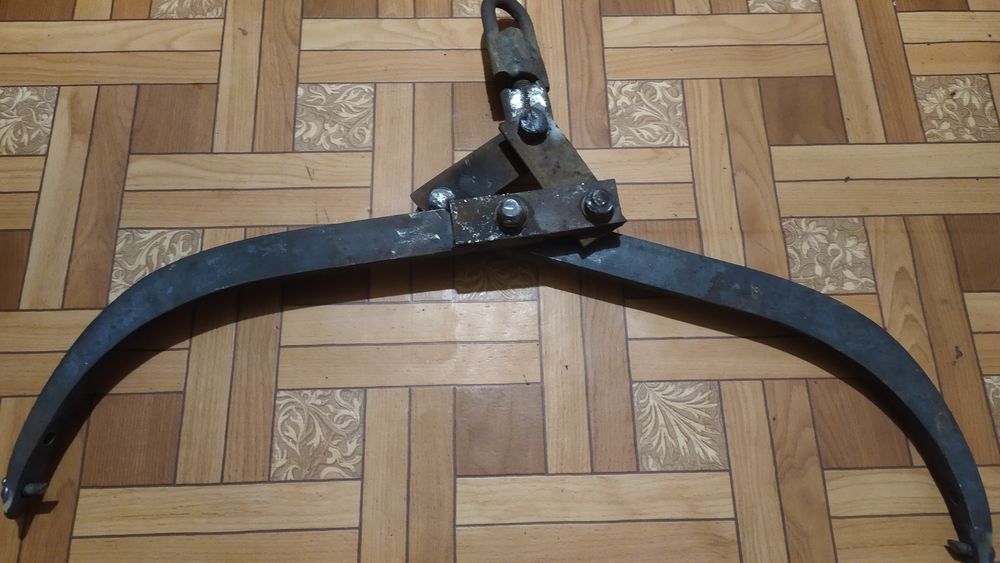 Кліщі для загрузки колод