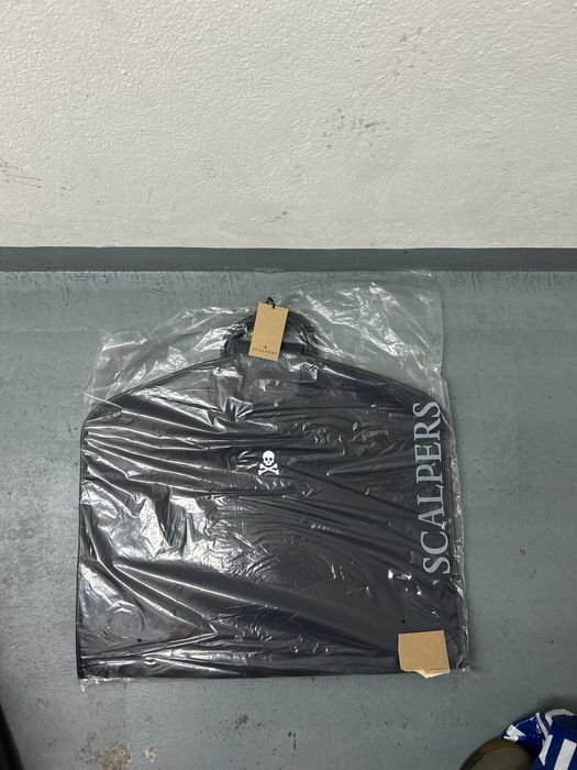 Porta fatos Scalpers