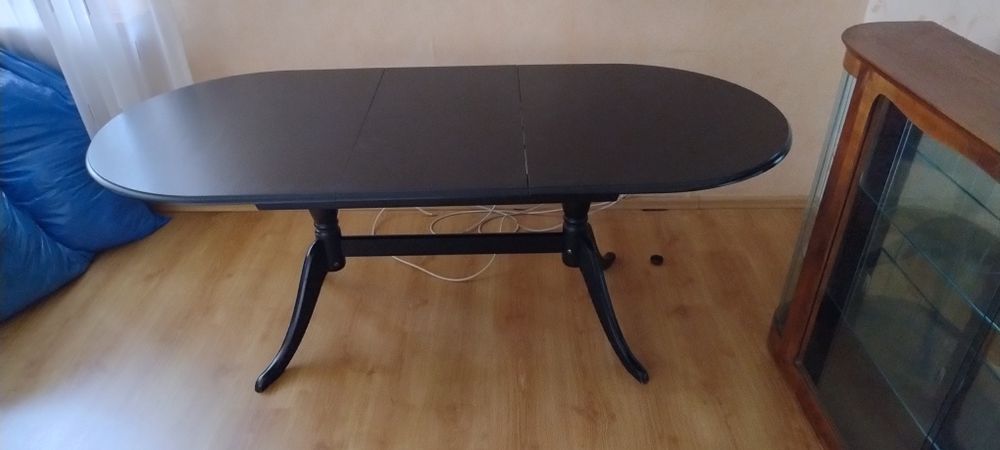 Stół drewniany czarny owalny rozkładany