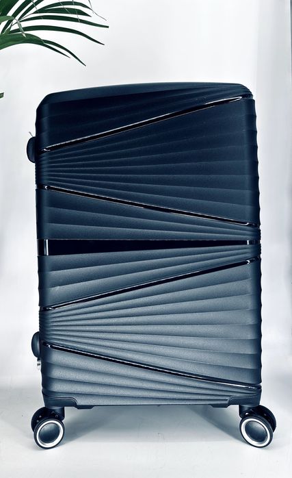 Nowa średnia walizka gumowa - wysyłka Olx