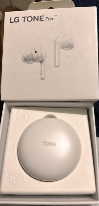 LG tone free brancos