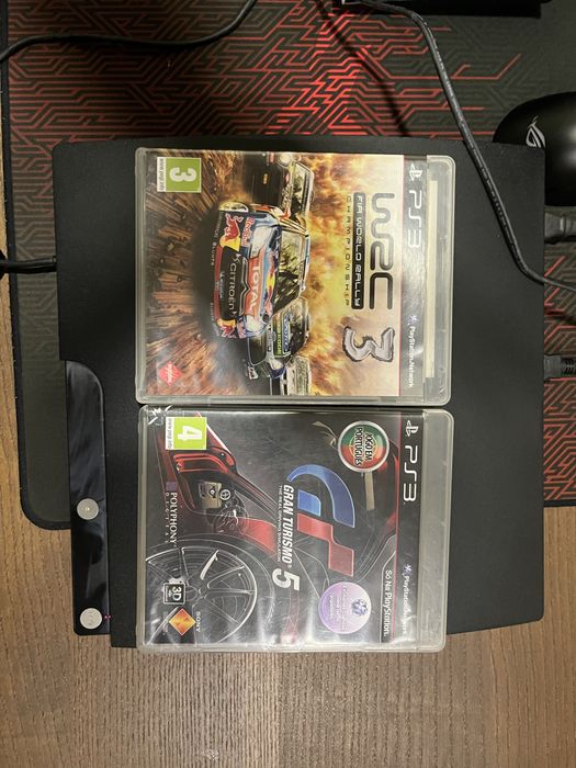 PS3 Slim com 2 jogos
