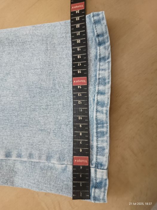 Spodnie dzwony z dziurami rozciągliwe dla dziewczynki rozm. 150