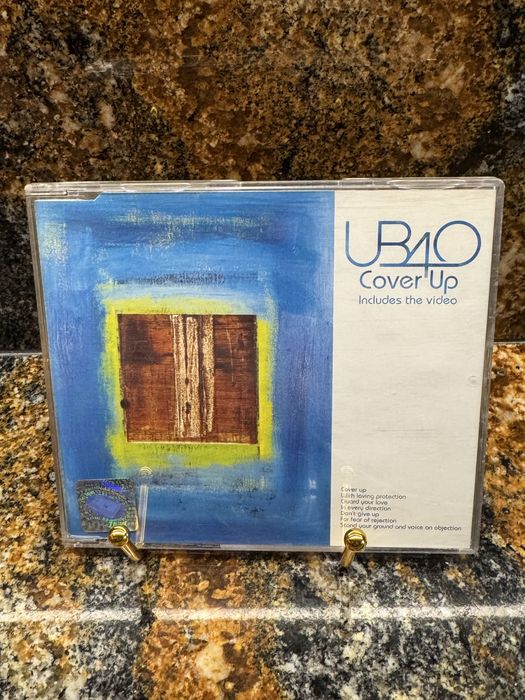 CD UB40 – Cover Up (Includes the video)
