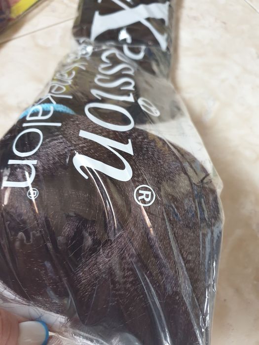 Волосы для плетения косичек.