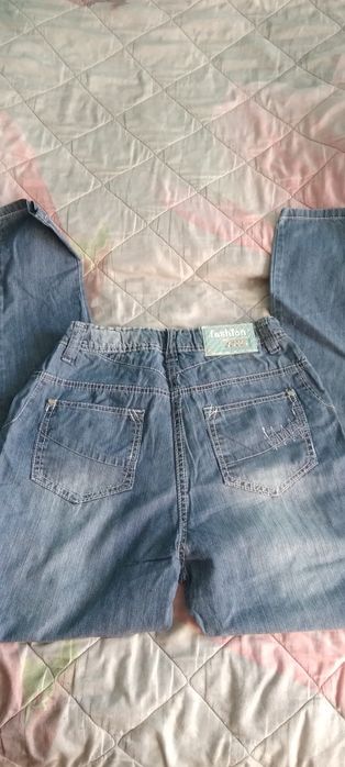 Nowe spodnie jeansowe 170-176