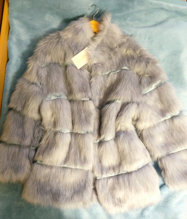 Missguided futerko niebieskie z przeszyciami M