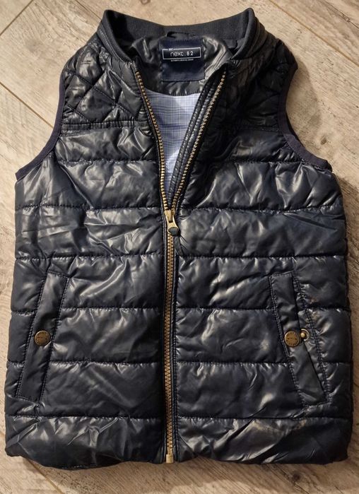 Nowy bezrękawnik marki next r.116