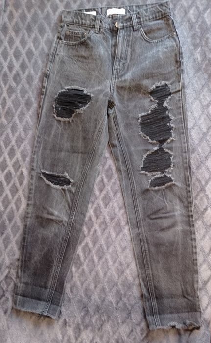 Dżinsy z dziurami XS