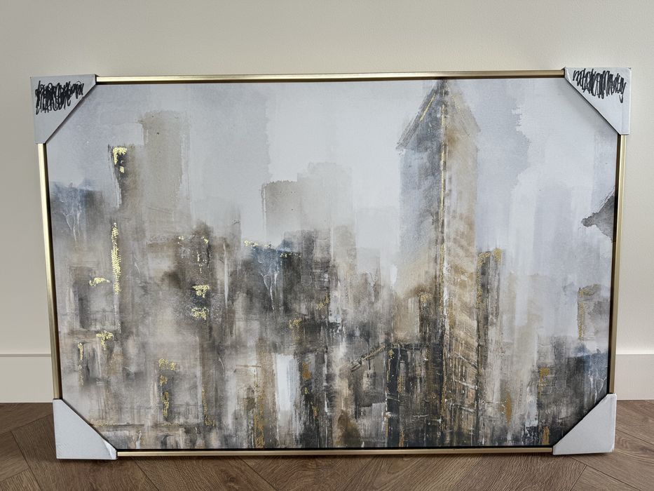 Obraz w zlotej ramie