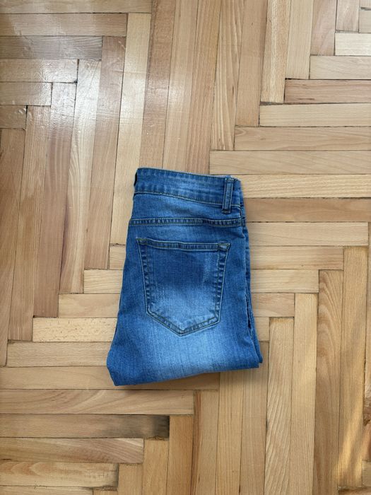 Stylowe Spodnie À La Jeansy z przetarciami Denim & Co  M 38