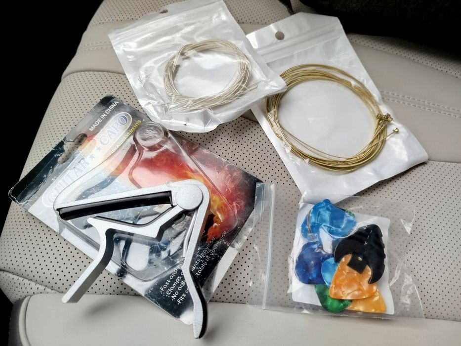 Струни медіатор каподастр