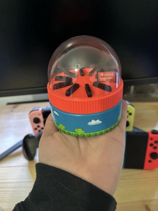 Consola Nintendo Switch Oled com comandos e jogos