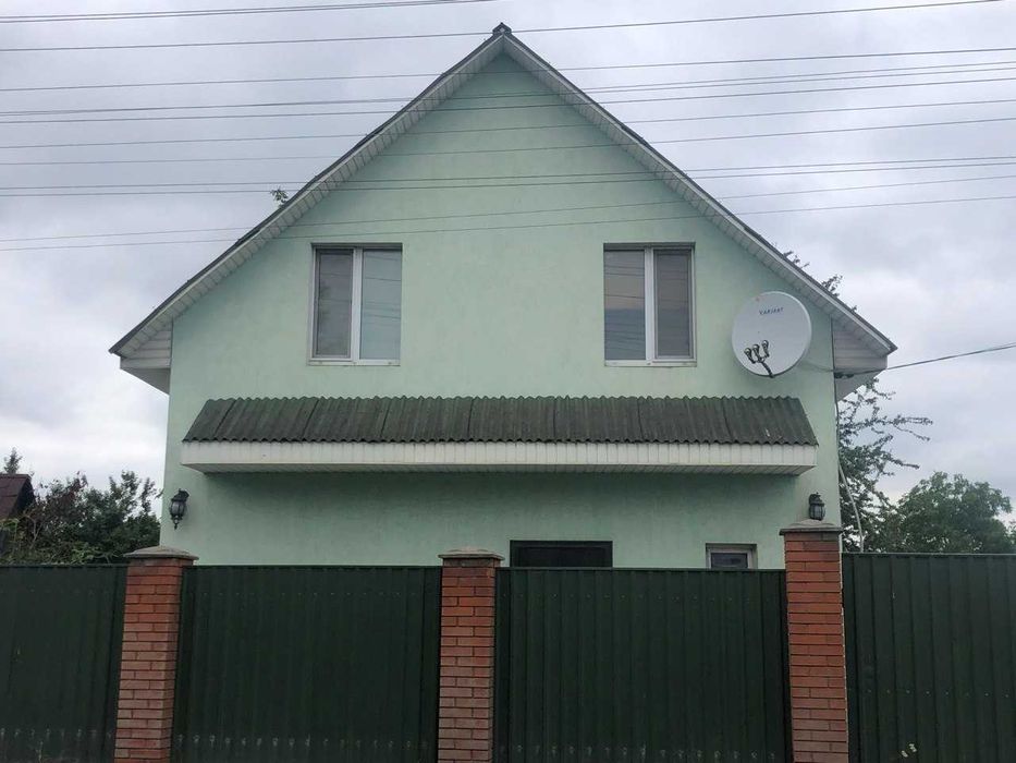 Ділянка 7 сот з будинком у с.Хотів по вул.Шевченка.