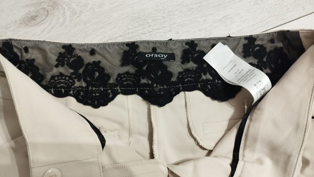 Eleganckie beżowe damskie spodnie Orsay