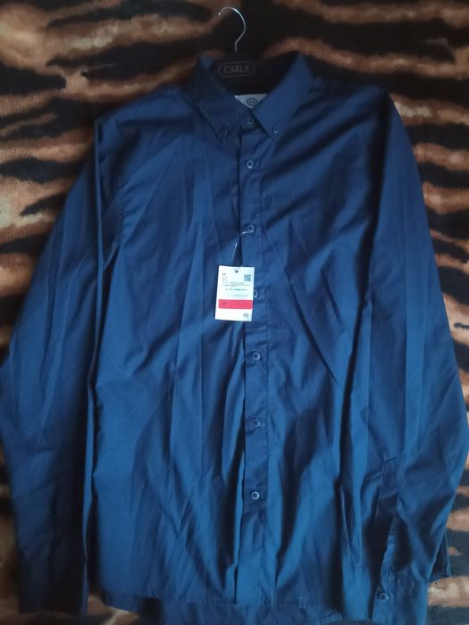 Продам новую рубашку.