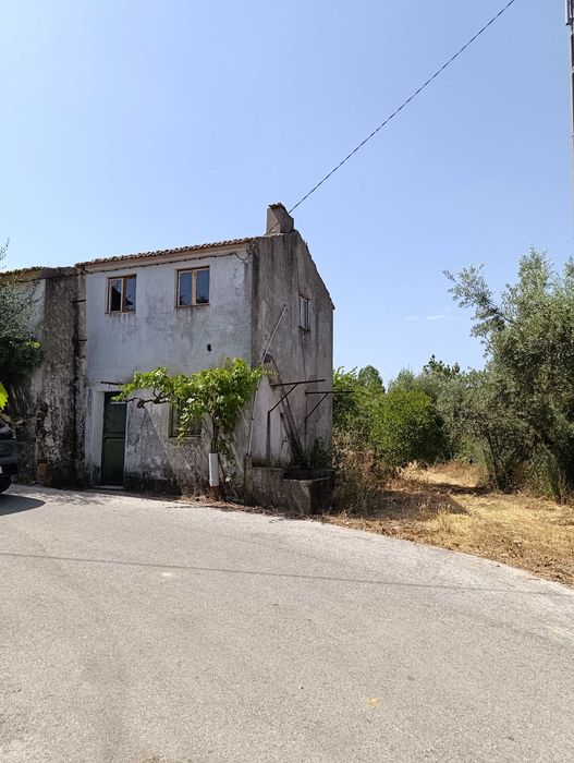 Casa antiga com terreno