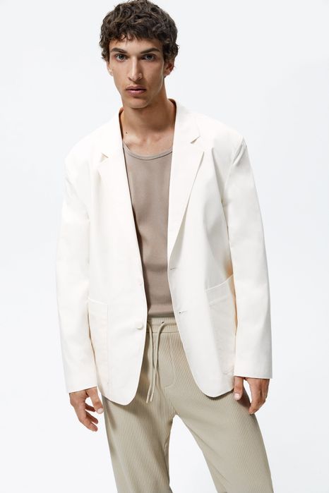 ZARA M beżowe plisowane męskie spodnie wygodne o kroju relaxed fit