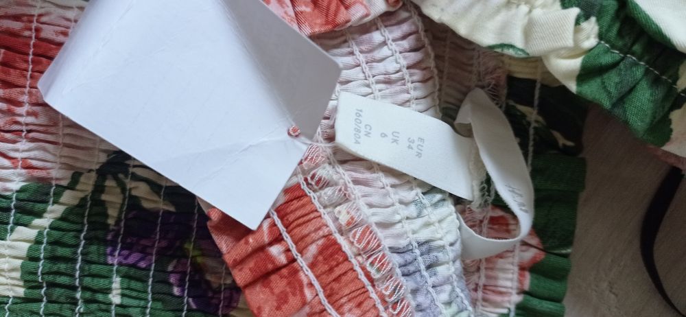 Nowy kombinezon w kwiatki H&M rozm Xs