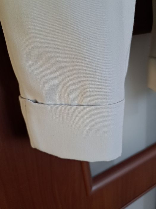 Spodnie damskie jasny beż Reserved S-ka