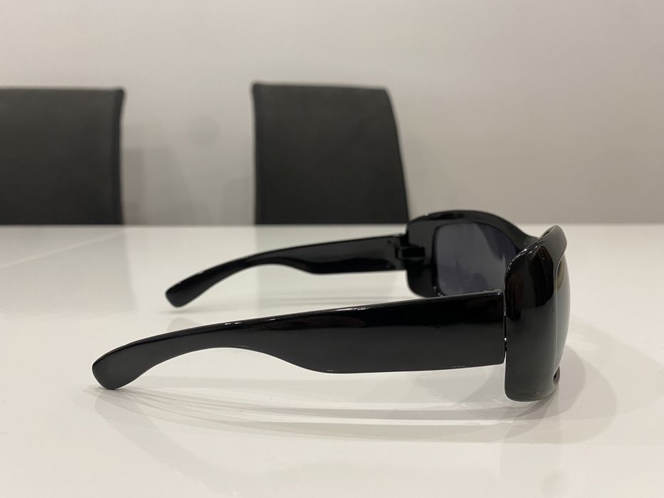 Oculos de Sol pretos